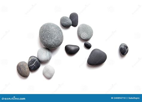 Scattered Sea Pebbles Smooth Gray And Black Stones Isolated On White