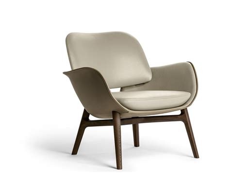 The most famous armchair in the world, the luxurious leather 'barcelona chair', designed by the architect ludwig mies van der rohe in 1929 and manufactured by knoll international, has no armrests, while jasper morrison's 'tagliatelle. Upholstered leather armchair with armrests MARTHA By ...