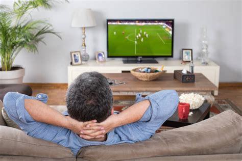 Man Watching Tv Stock Photos Pictures And Royalty Free Images Istock