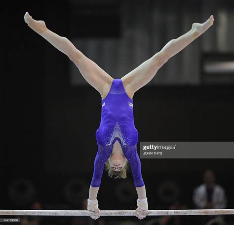 Russias Anastasia Grishina Performs On The Uneven Bars