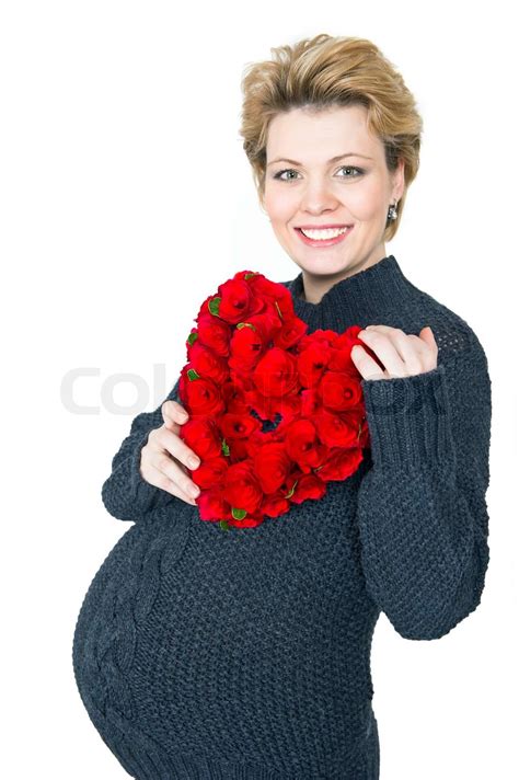 gravid kvinde med røde roser hjerte Stock foto Colourbox