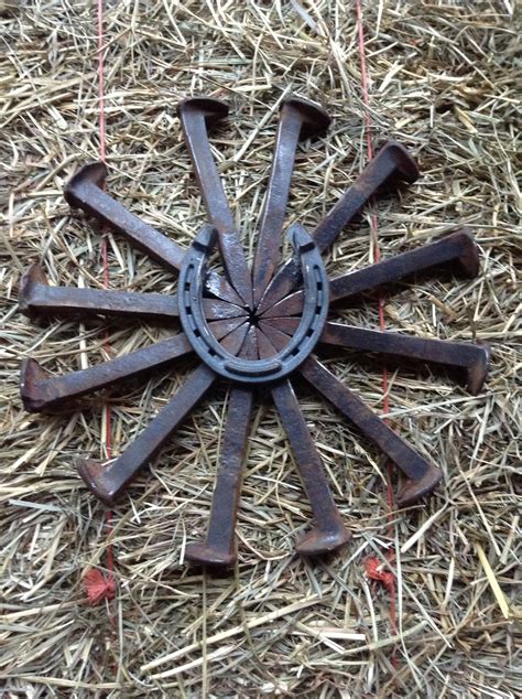 Railroad Spike Bursting Star With Horse Shoe Check Out American Outlaw