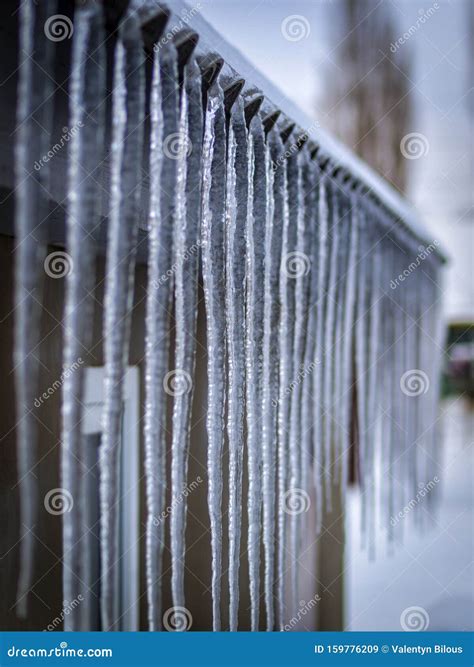 Frozen Icicles Hanging From The Roof Of A House Stock Image Image Of