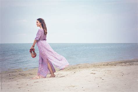 Woman Having A Walk On The Beach By Stocksy Contributor Lumina Stocksy