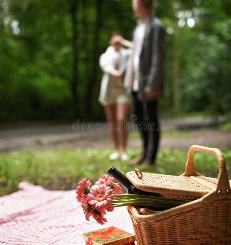 surprise picnic and couple with love nature and happiness with marriage anniversary and