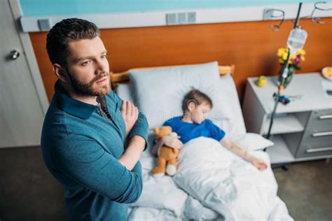 Pensive Dad Standing Near Sick Son In Hospital Bed Stock Image Image Of Diseased People 93940179