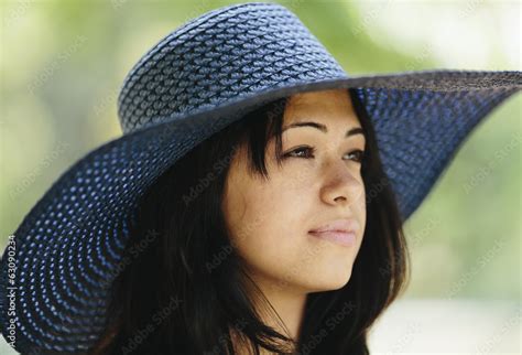 Foto Stock Closeup Of Woman With Hat Adobe Stock