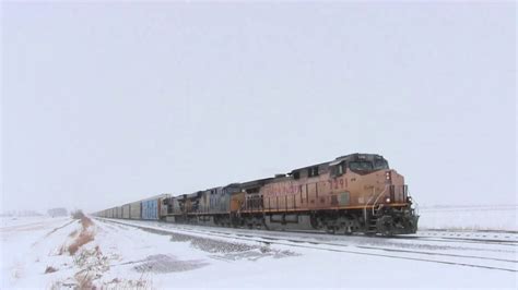 Union Pacific Freight Train In Snow Storm And Cars Stuck In Snow Youtube