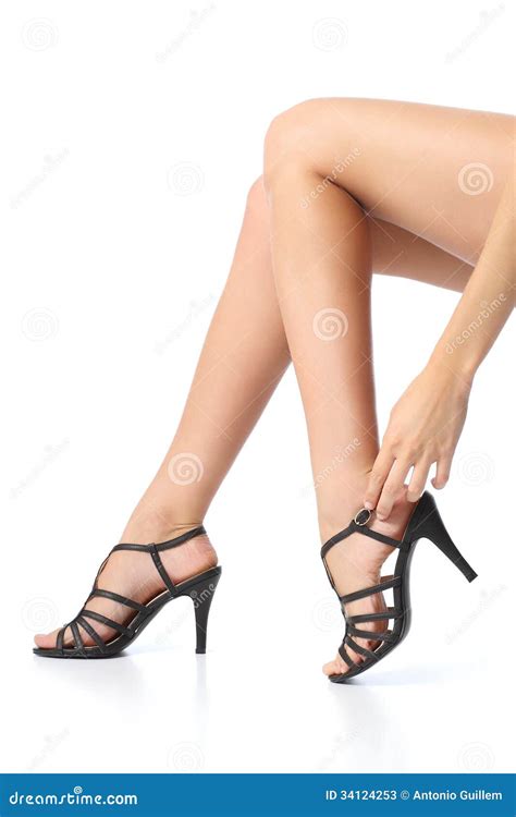 Woman With Beautiful Legs Touching The Heel Of The Foot Stock Image