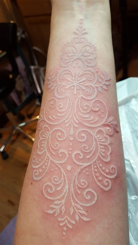 The white lace tattoos are super feminine and give an elegant touch to your outfit. White tattoo. Styled from the lace on my wedding dress | White tattoo, Lace tattoo design, Small ...