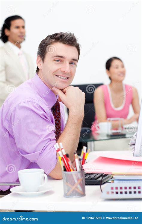 Attractive Businessman Smiling At The Camera Stock Photo Image Of