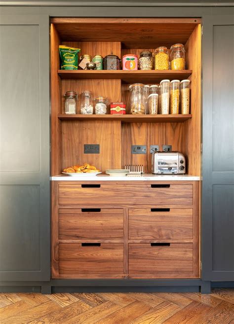 Walnut continues to be prized for cabinets generally for two main reasons. Stunning American Black Walnut inner cabinetry in this striking full height larder. Cabinet ...