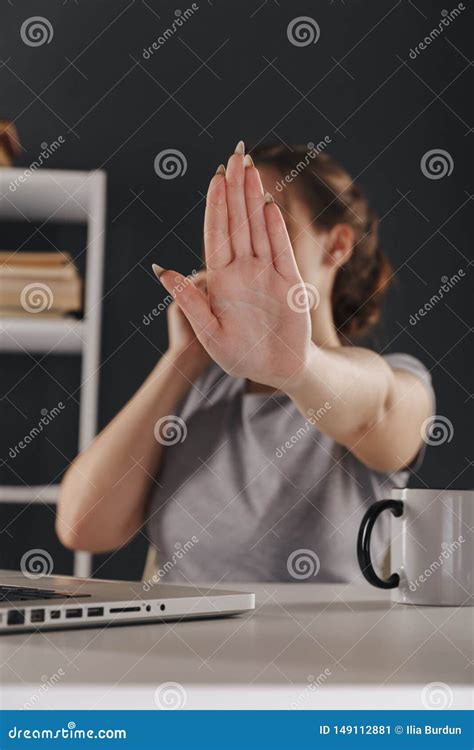 Woman In Office Showing Stop Sign And Talking Phone Isolated Stock
