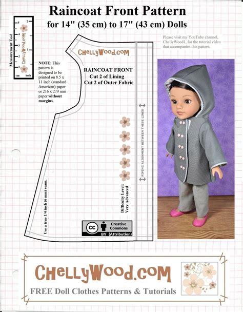 The Image Shows A 14 Inch Or 15 Inch Doll Wearing A Hooded Raincoat O