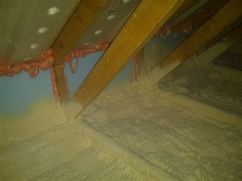 Closed Cell Spray Foam Insulation Covers The Attic Floor To Provide A