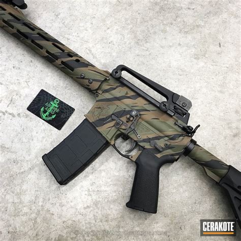 Tactical Rifle Featuring A Custom Cerakote Tiger Stripe Camo By Web