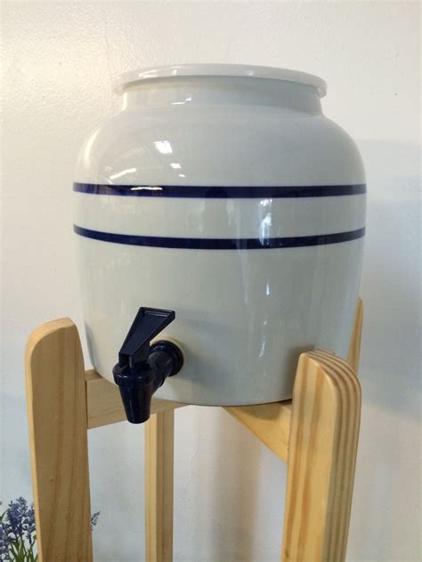 Porcelain Ceramic Water Dispenser Blue Stripes And Natural Wood Floor