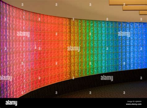 Curved Glass Block Brick Wall With Colored Fluorescent Lights At Stock