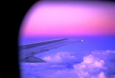 View Of Sunset Out Airplane Window Photograph By Justin Bailie Pixels