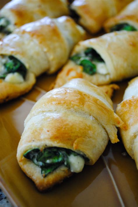 Position an egg roll wrapper with one point toward you. Cheesy Spinach Crescent Rolls | Recipes, Dinner Ideas ...