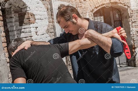 Self Defense Techniques Against A Knife Attack Stock Image Image Of