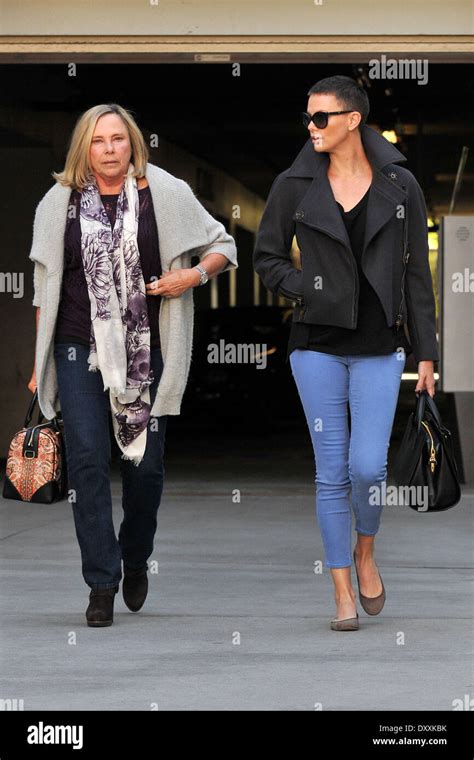 actress charlize theron and her mother gerda theron catch a movie at arclight theater hollywood