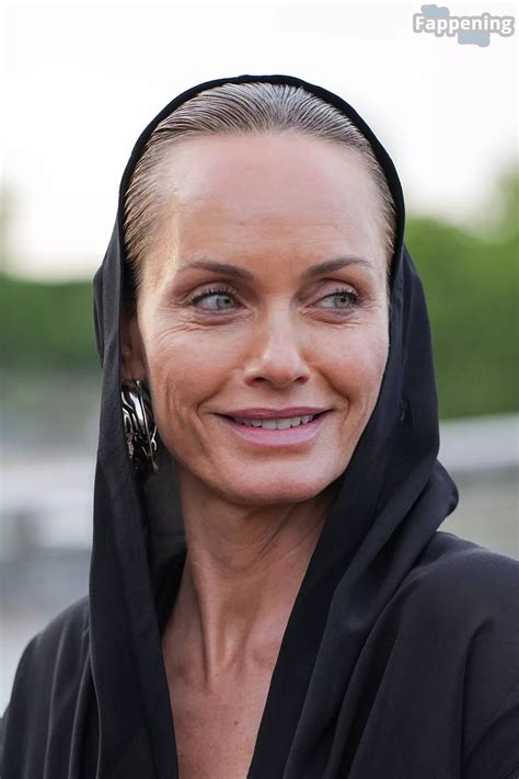 Amber Valletta Flashes Her Nude Tits As She Attends The Alaia Winter Spring 2024 Show In Paris