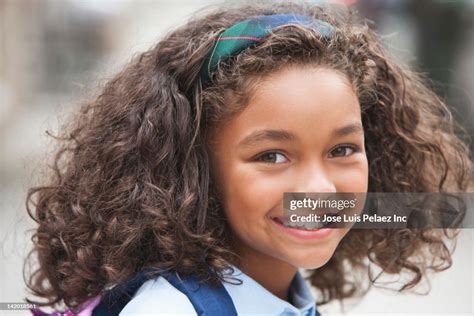 Smiling Mixed Race Girl High Res Stock Photo Getty Images