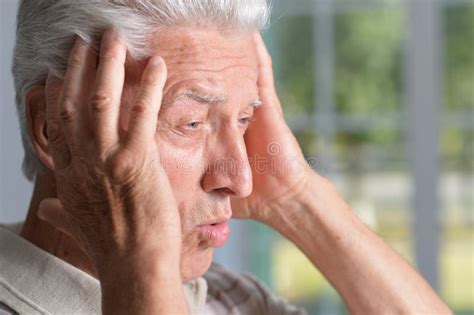 Portrait Of Sad Sick Senior Man With Headache Stock Photo Image Of