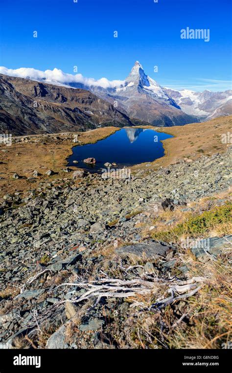 The Tip Of The Matterhorn Is Reflected In Lake Stellisee Zermatt Canton