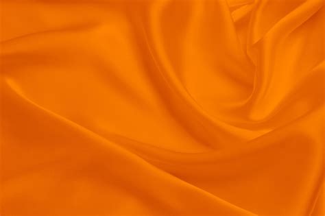 Premium Photo Orange Fabric Texture Background Detail Of Silk Or
