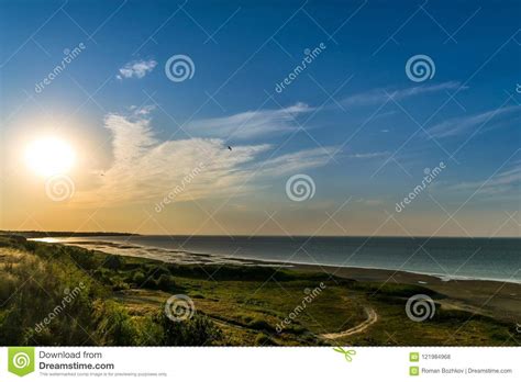 Beautiful Sunset Over The Sea Shore Clear Summer Evening With A Little