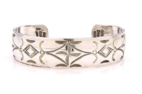 Lot GILBERT BEGAY NAVAJO STERLING SILVER STAMPED CUFF