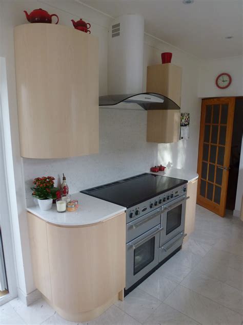 The cabinet frames were covered in a maple veneer. Maple veneer curved kitchen cupboards with granite work ...
