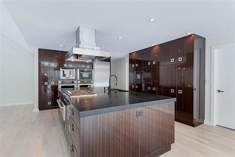 High Gloss Brown Cabinets Wow In Contemporary Kitchen Hgtv
