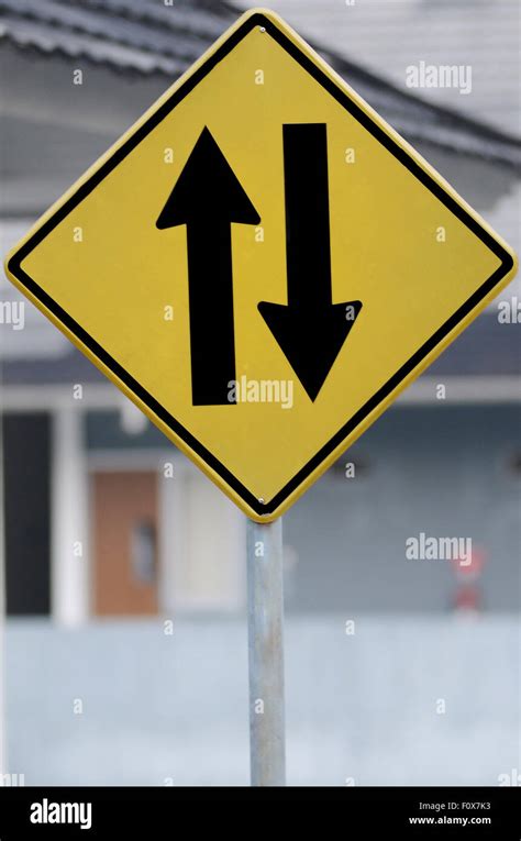 Road Sign Two Way Traffic Ahead Watch For Oncoming Traffic Ahead Stock