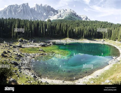 Landscape And Reflections In The Famous Lake Of Carezza Dolomites