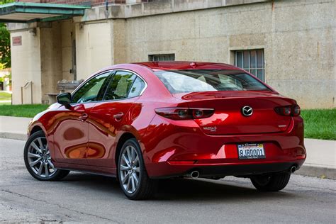 The driver and front passenger sit low and lean back, like in a sports car. 2019 Mazda 3 AWD Review - Promotion and Relegation - The ...