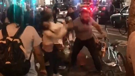 video shows man punch two women in the face after arguing with