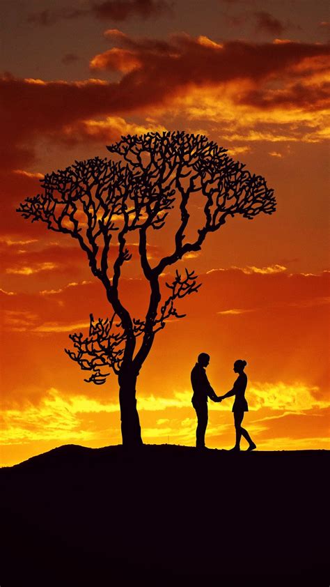 Download Wallpaper 1080x1920 Silhouettes Couple Love Sunset Tree