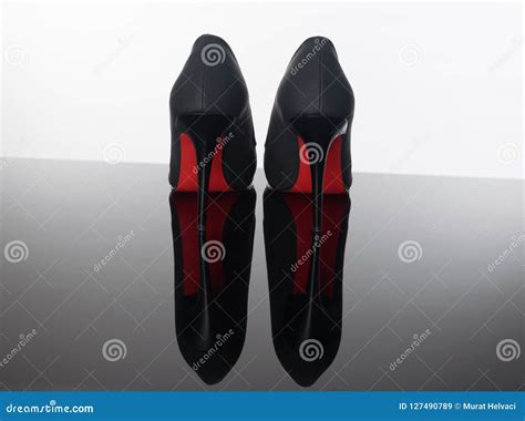 Pair Of Pointed Woman Shoes With Black Soles Red High Heels Stock Image