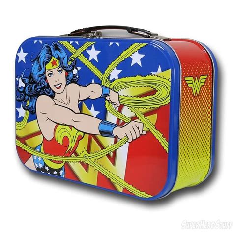 A Lunch Box With Wonder Woman Artwork On The Front And Sides Holding A