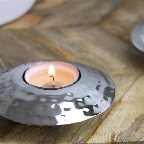 Three Round Silver Hammered Tea Light Holders By Marquis And Dawe