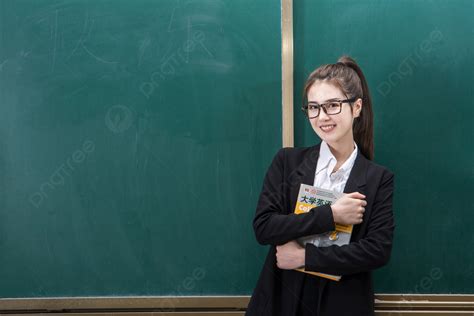The Female Teacher With Glasses Is In Class Background Teacher Teachers Day Female Teachers