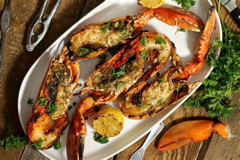 grilled atlantic lobster brushed with garlic butter and herbs earth food and fire