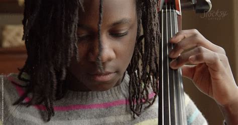 African American Girl Playing Cello By Stocksy Contributor Gabi
