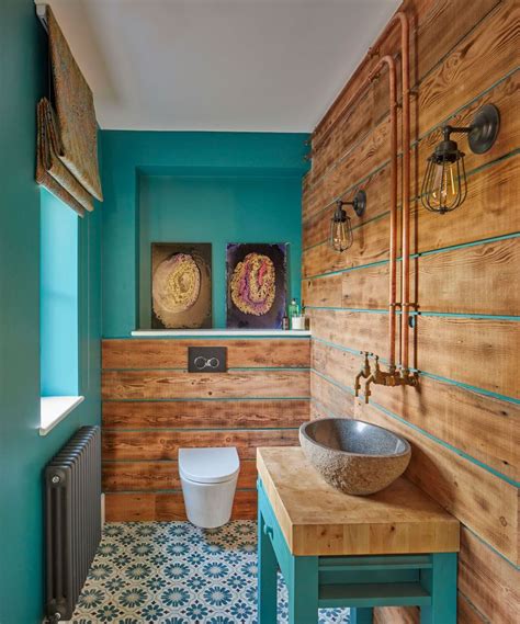 15 Design Tricks To Make A Small Bathroom Look Bigger Real Homes