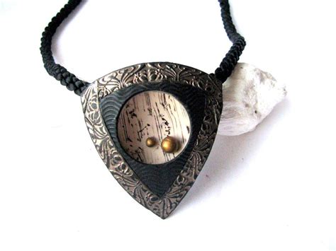 These polymer clay owl necklaces are absolutely adorable! I made this vintage style polymer clay necklace ...