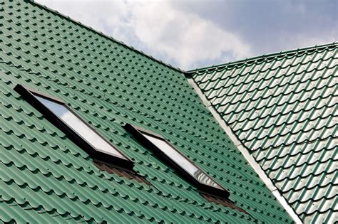 Prepainted metallic-coated steel sheet for building panels