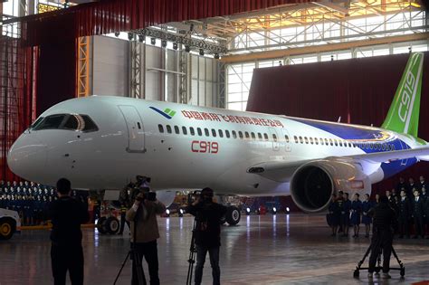 First Made In China Passenger Jet Unveiled Al Jazeera